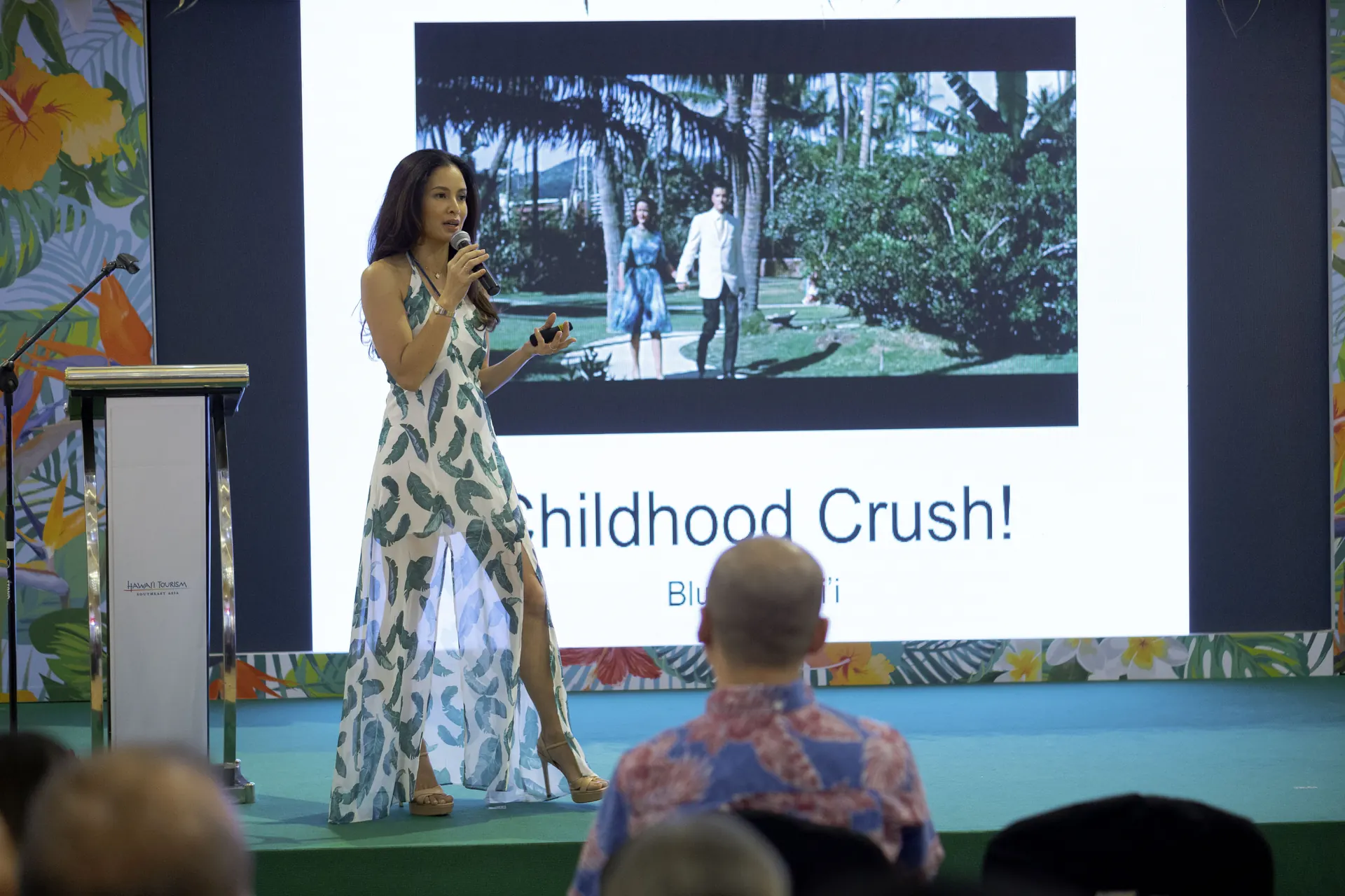 Daphne Iking on stage at a professional speaking engagement