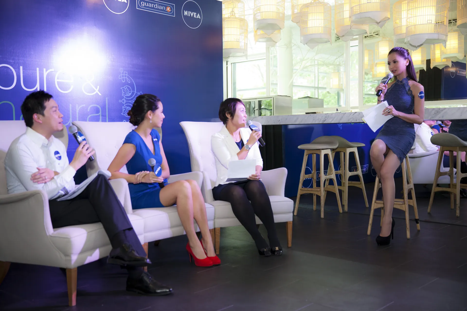 Daphne Iking moderating a panel discussion